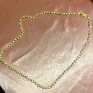 30in mikimoto necklace 7mm pearls. vintage. 18k gold clasp. Appraised 6,100